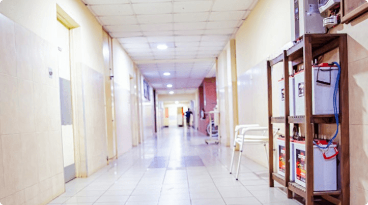 Bright Niger Foundation Hospital ward corridor with patient room doors